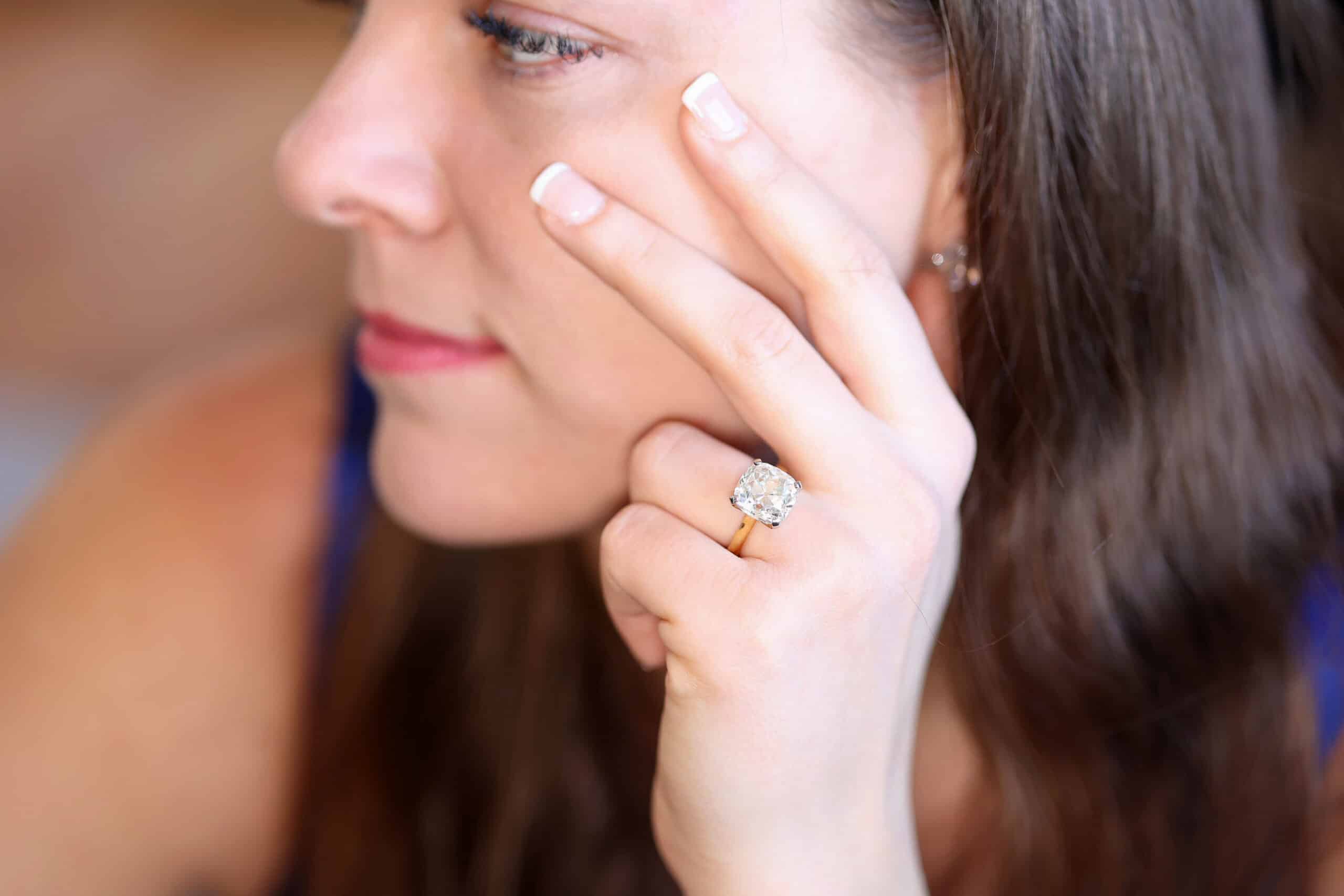 an Old Miner cut in a simple yellow gold ring