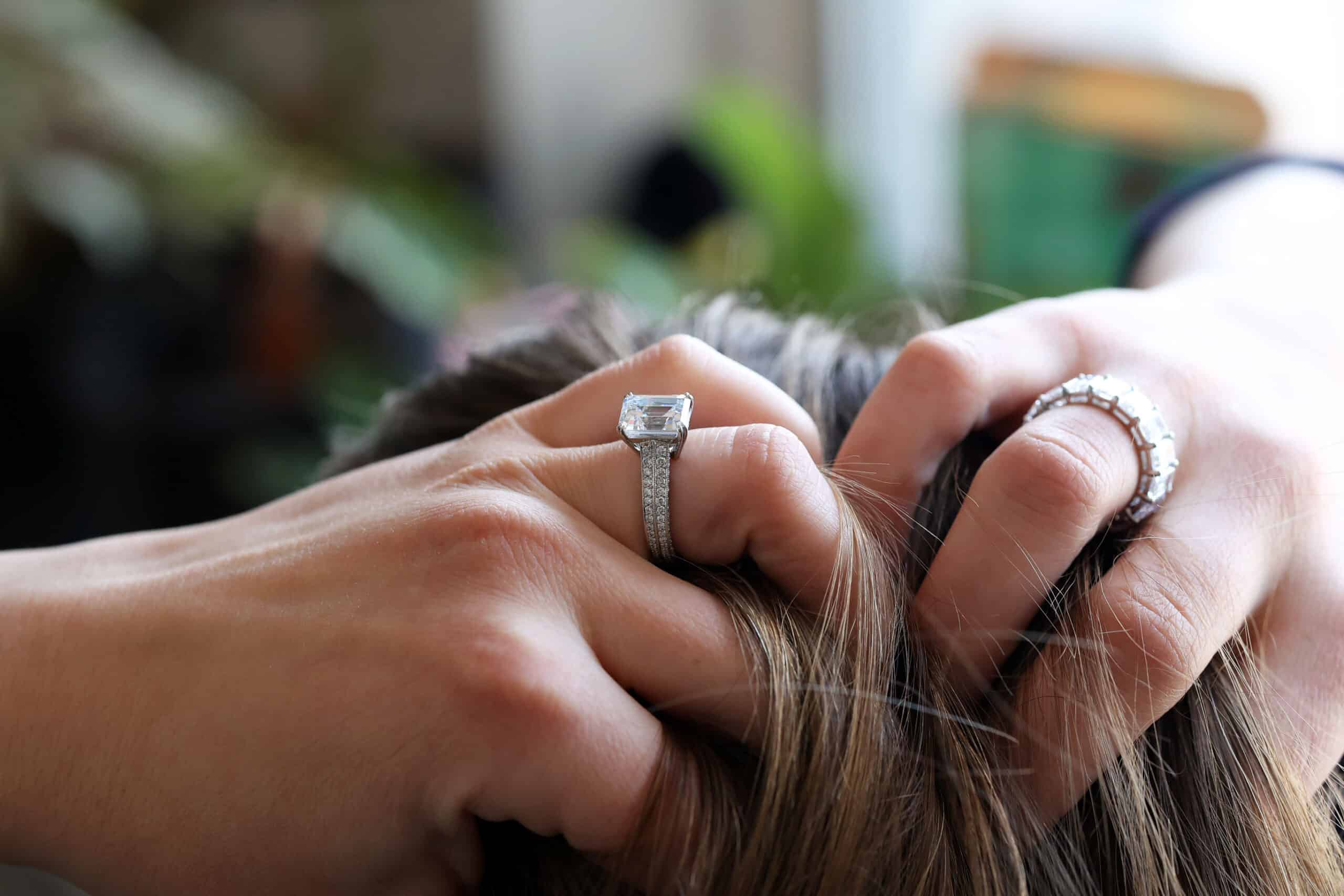 4.03ct Emerald cut diamodn in a two-row Channel setting