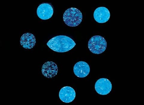 diamond_fluorescence Fluorescent diamonds under a UV light