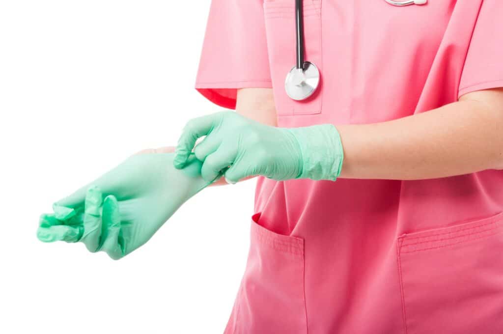 doctor nurse engagement ring under gloves