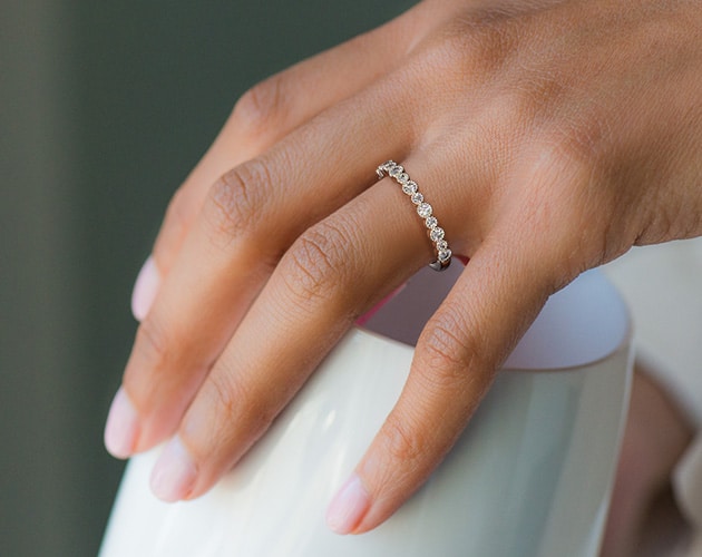 An altering bezel eternity ring