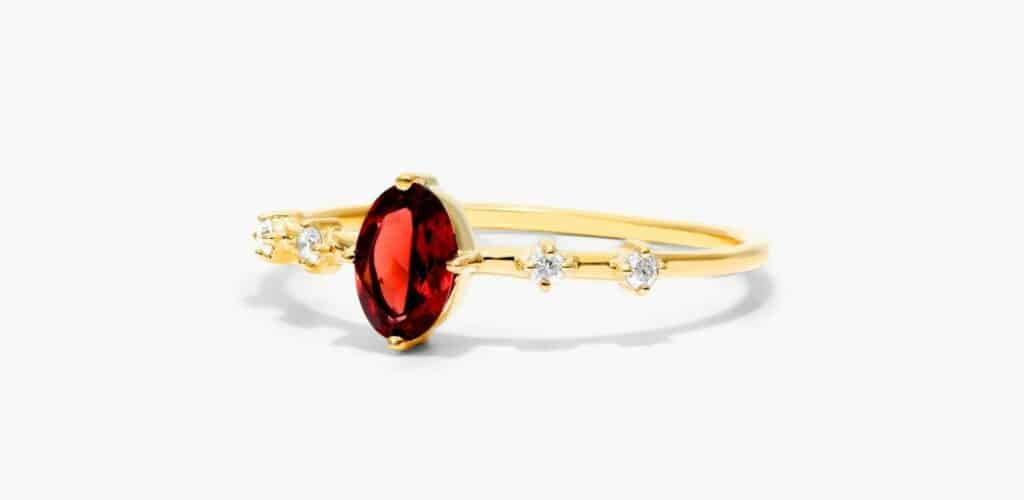 Dainty Garnet gemstone ring in yellow gold