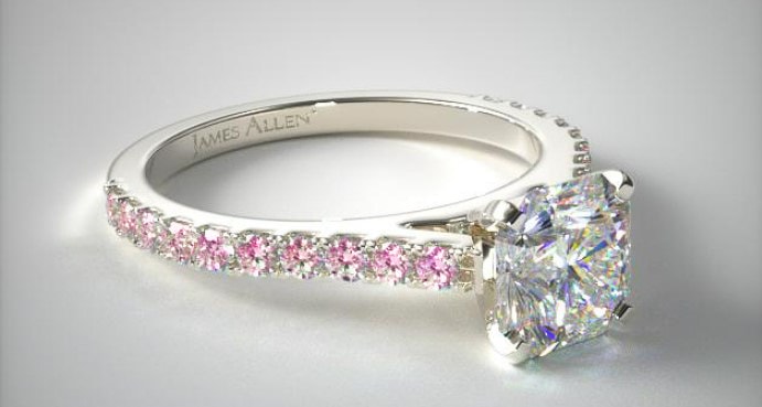 A graphic showing a side stone setting from James Allen set with pink sapphires