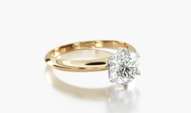 Yellow gold solitaire setting round diamond