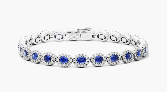 Blue sapphire bracelet with diamond halo