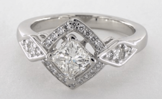 Vintage white gold engagement ring with a princess cut