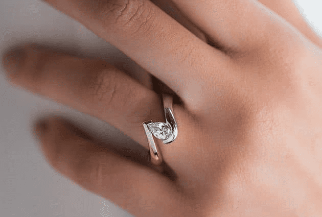 Two-Tone White And Yellow Gold Swirl Tension Setting from James Allen