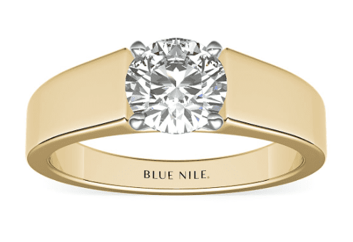Wide Band Solitaire Engagement Ring in yellow gold